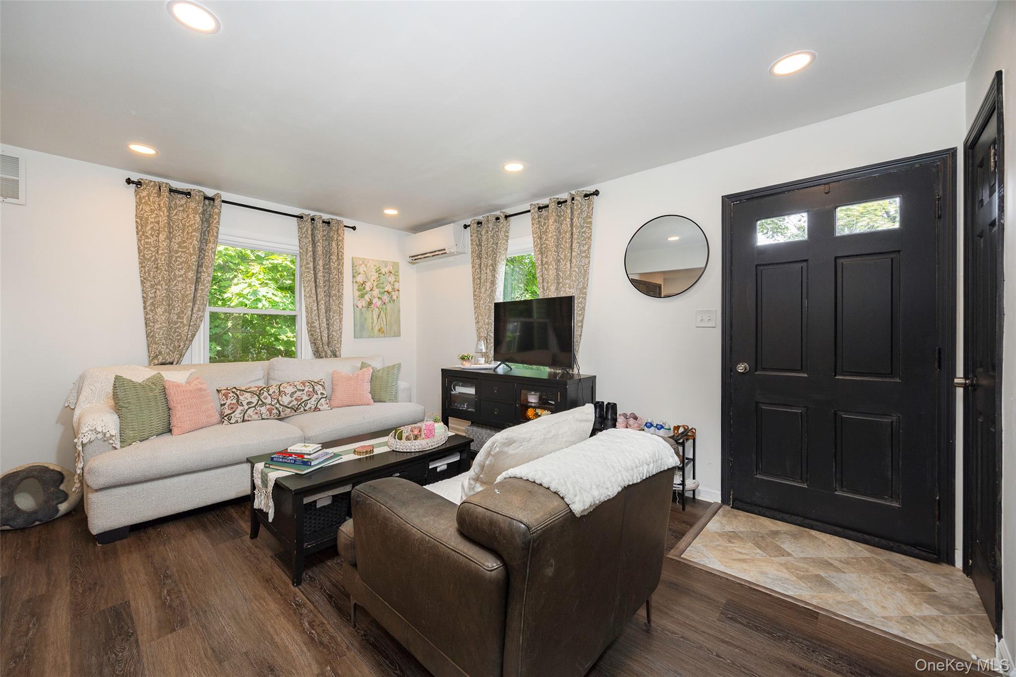 148 Bower Road Poughkeepsie, NY 12603 - Photo 4 of 19 a living room with furniture and a large window