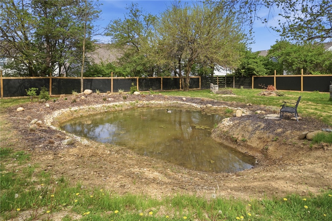 6155 North Union Road Clayton, OH 45315 - Photo 58 of 59 This tranquil backyard pond offers a peaceful outdoor retreat.