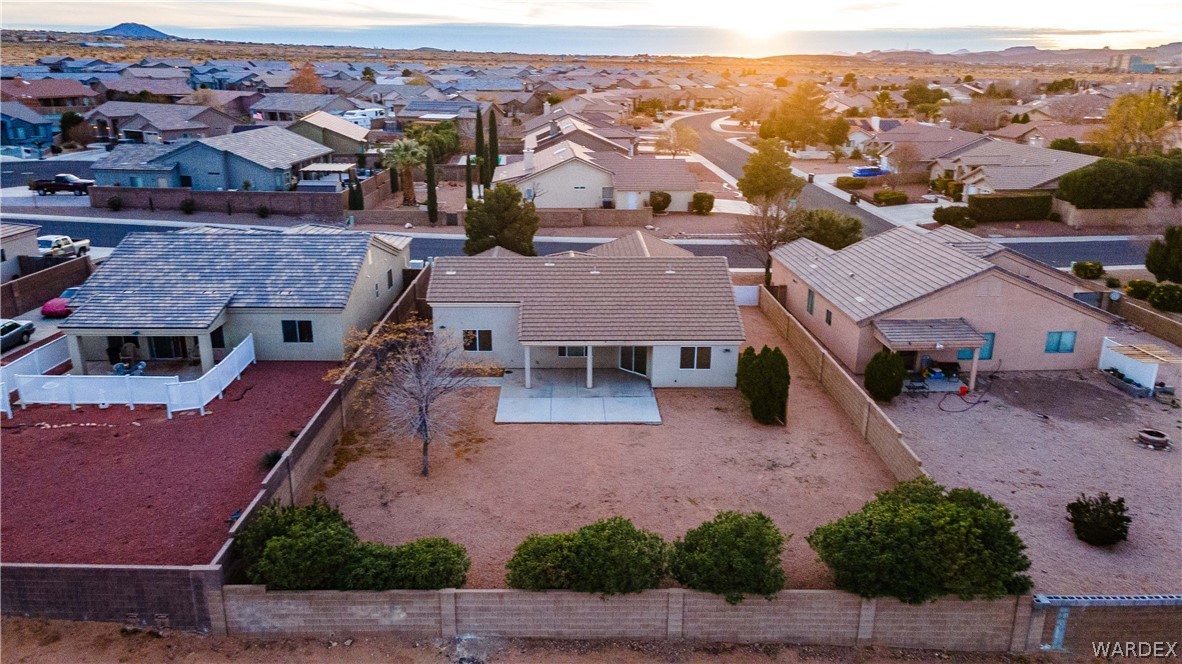 3374 Roma Road Kingman, AZ 86401 - Photo 25 of 64 Aerial view at dusk of a residential view