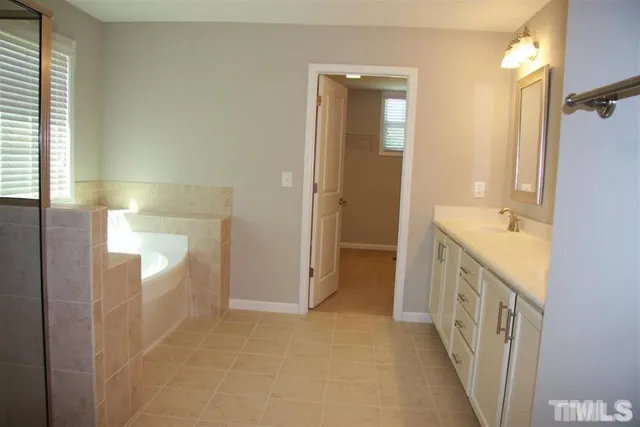 a bathroom with a sink and a tub