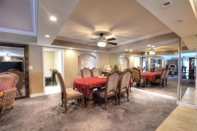 a view of a living room and chandelier