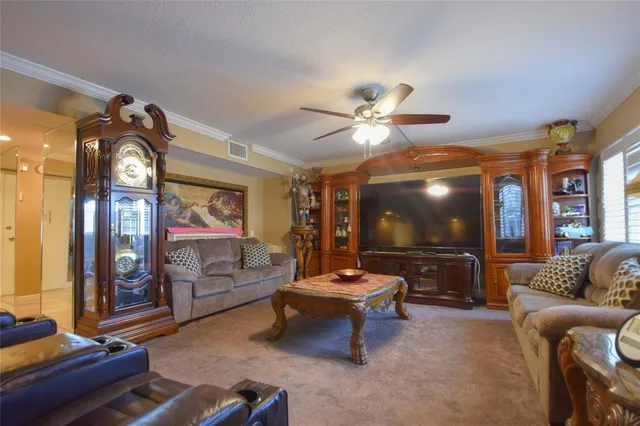 a bedroom with a bed dresser and a window