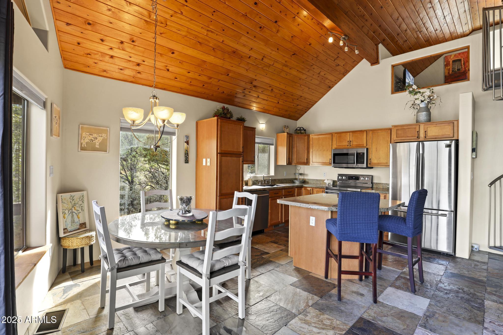 4977 North N Trails Pine, AZ 85544 - Photo 15 of 28 a view of a dining room with furniture window and wooden floor
