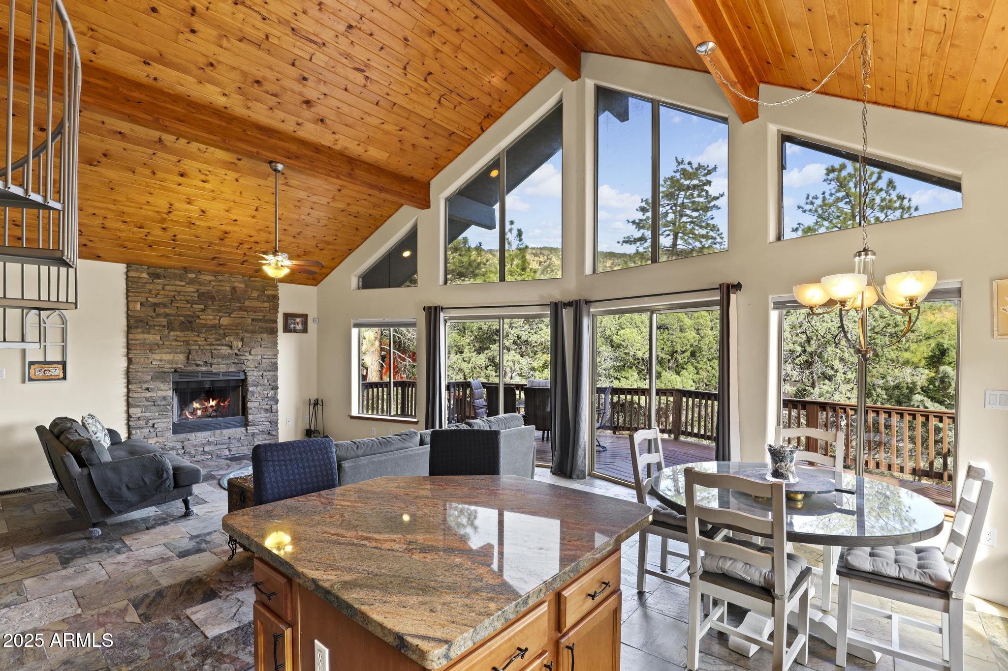 4977 North N Trails Pine, AZ 85544 - Photo 17 of 28 a view of a patio with couches table and chairs