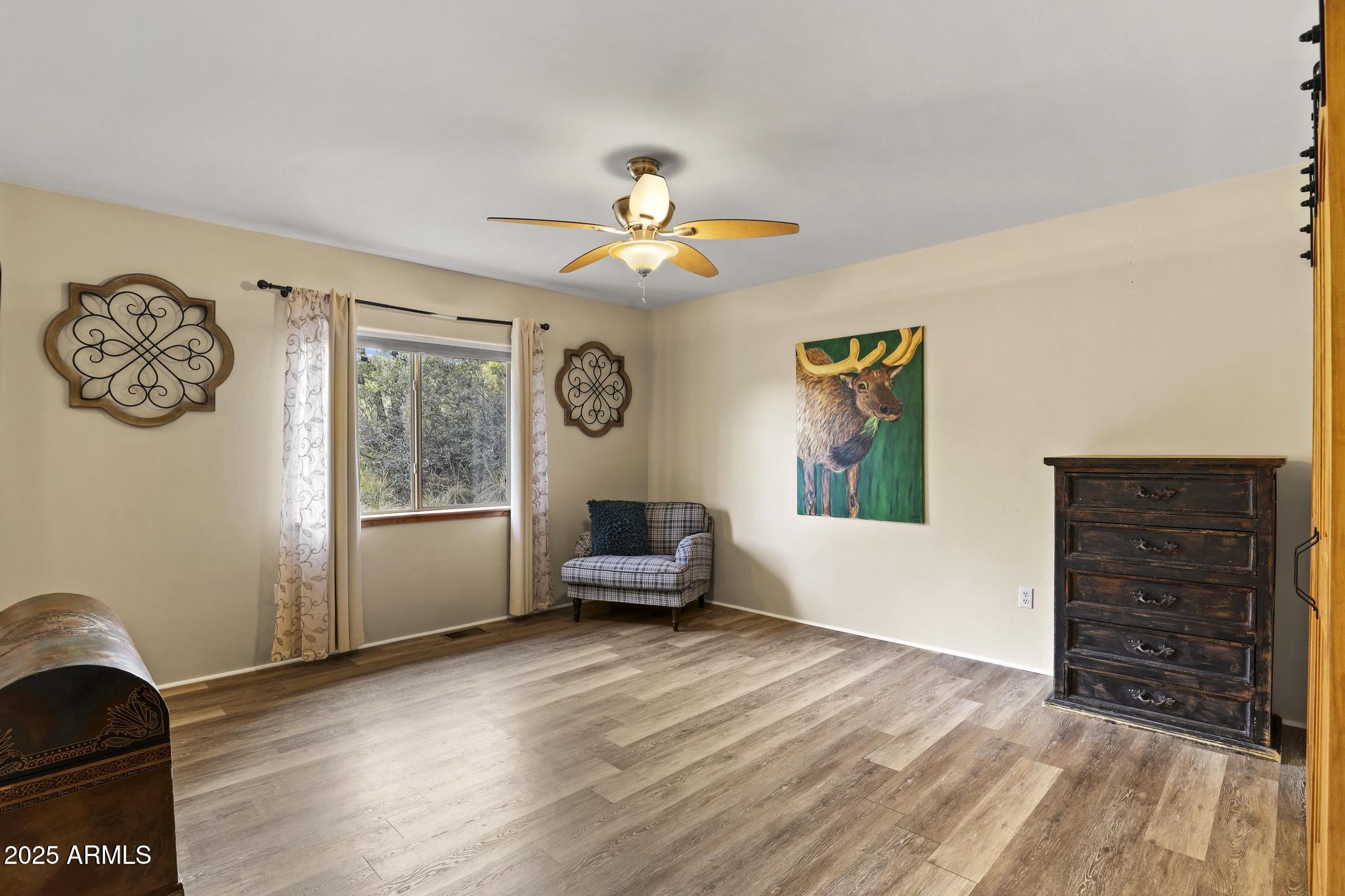 4977 North N Trails Pine, AZ 85544 - Photo 23 of 28 a living room with furniture and a window