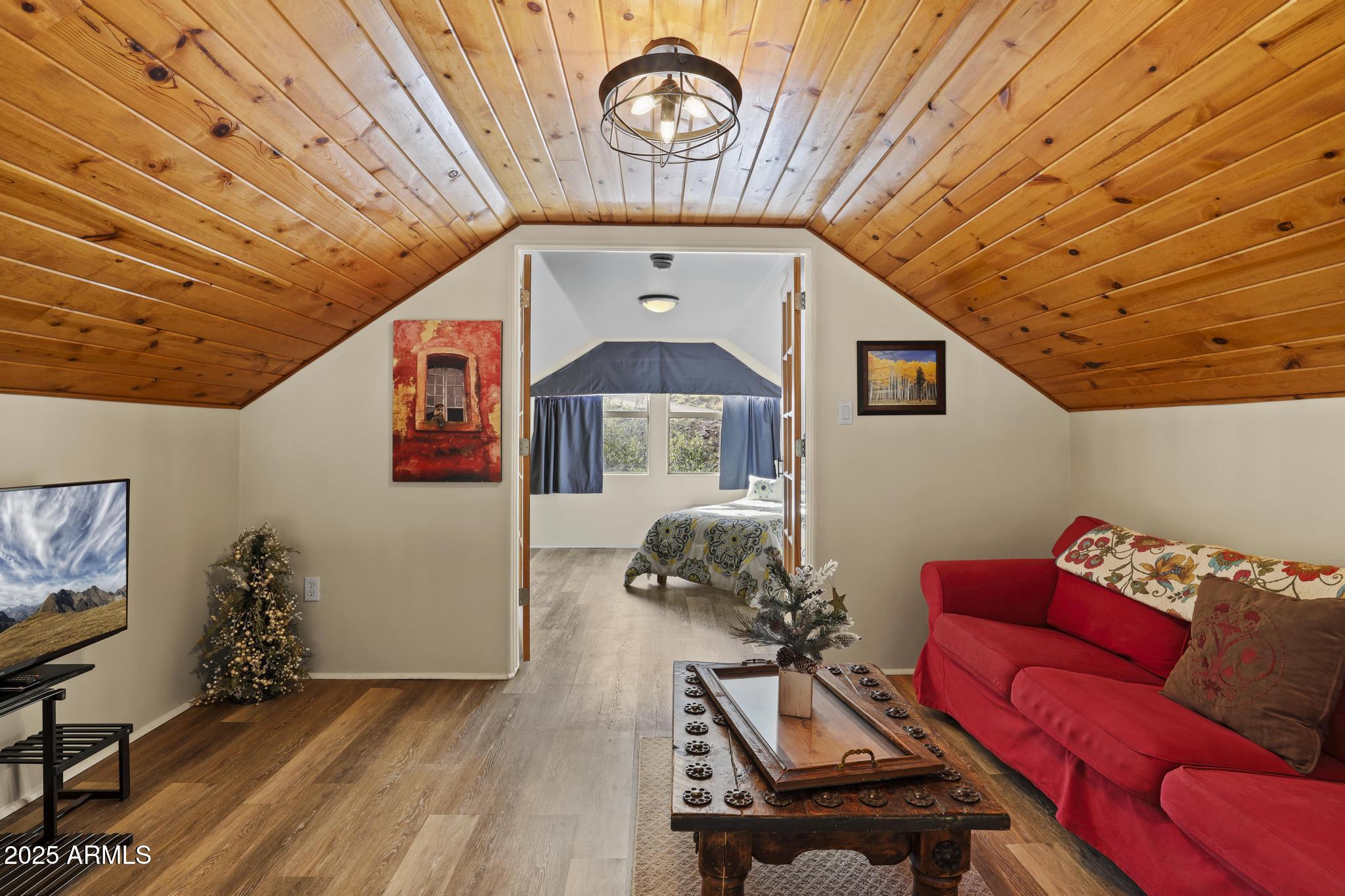 4977 North N Trails Pine, AZ 85544 - Photo 27 of 28 a living room with furniture and a wooden floor