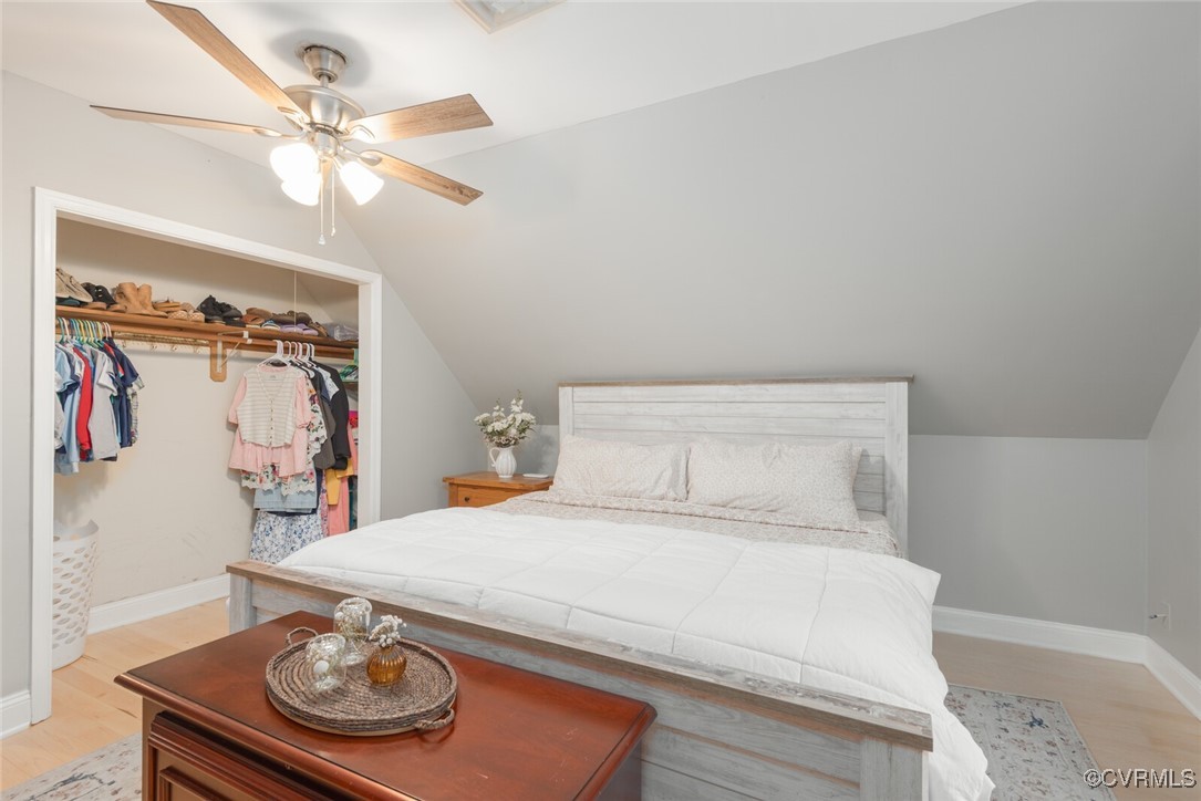 7313 Key Deer Circle Midlothian, VA 23112 - Photo 20 of 45 a bedroom with a bed and a chandelier