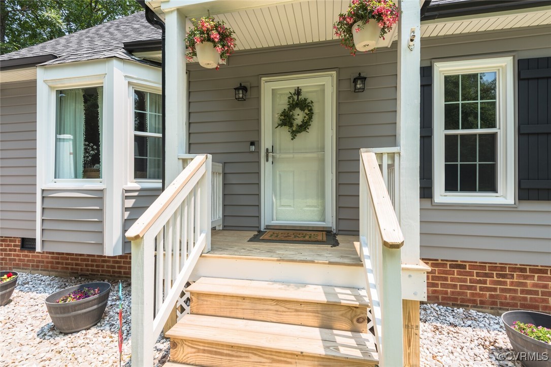 7313 Key Deer Circle Midlothian, VA 23112 - Photo 2 of 45 a view of a house with a door and a window