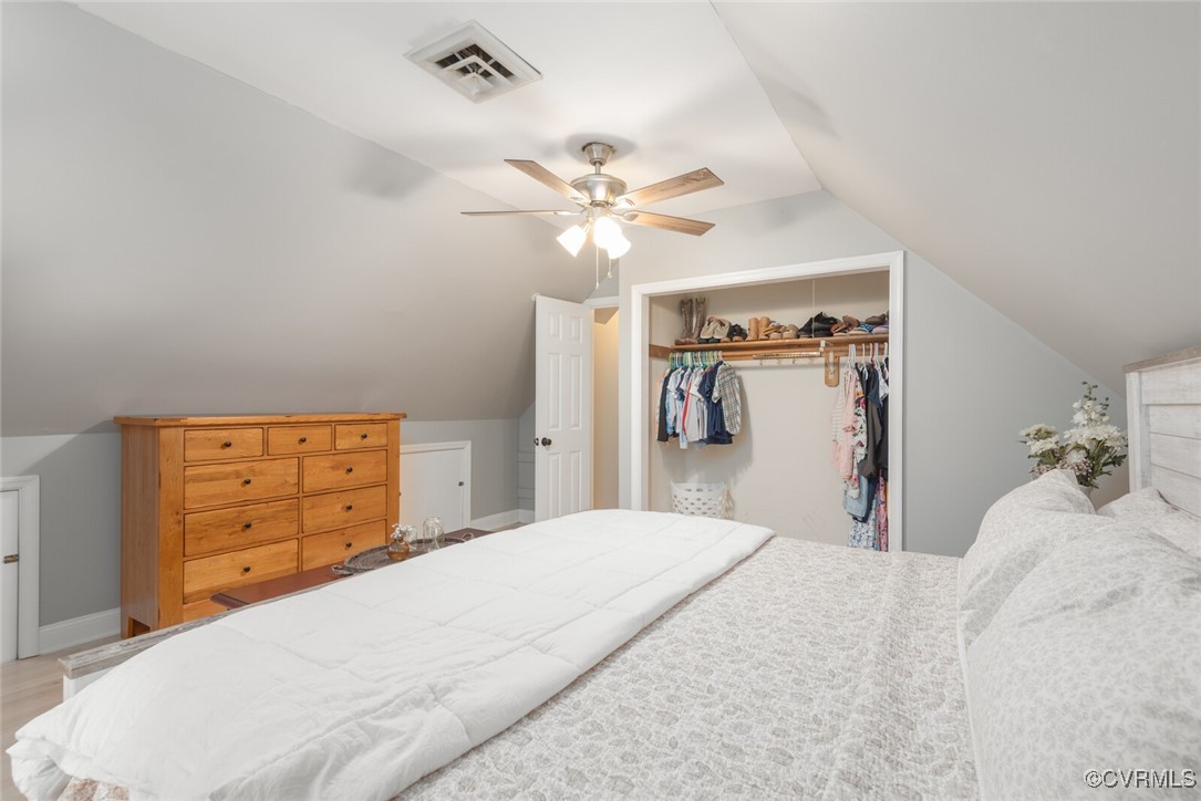 7313 Key Deer Circle Midlothian, VA 23112 - Photo 21 of 45 a bedroom with a bed and a chandelier