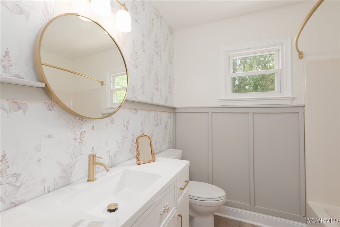 7313 Key Deer Circle Midlothian, VA 23112 - Photo 22 of 45 a bathroom with a sink a toilet and a mirror