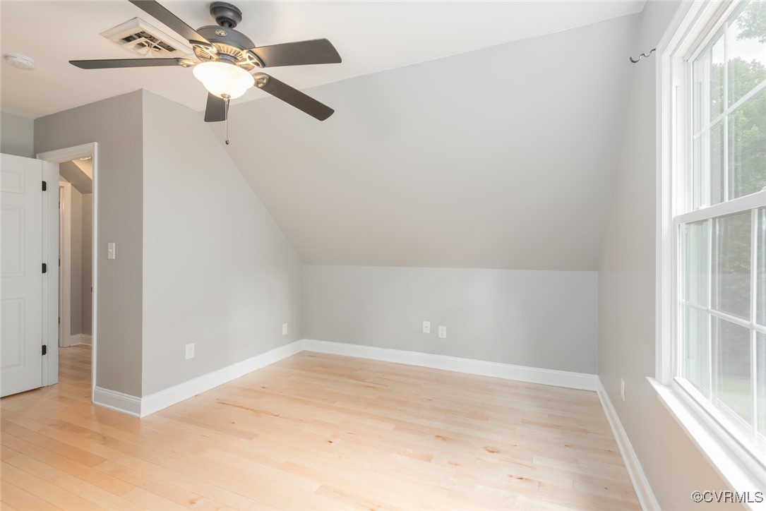 7313 Key Deer Circle Midlothian, VA 23112 - Photo 26 of 45 an empty room with a window and a fan