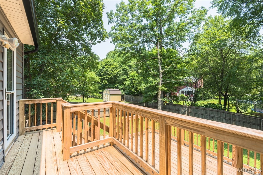 7313 Key Deer Circle Midlothian, VA 23112 - Photo 31 of 45 a view of balcony with deck and trees