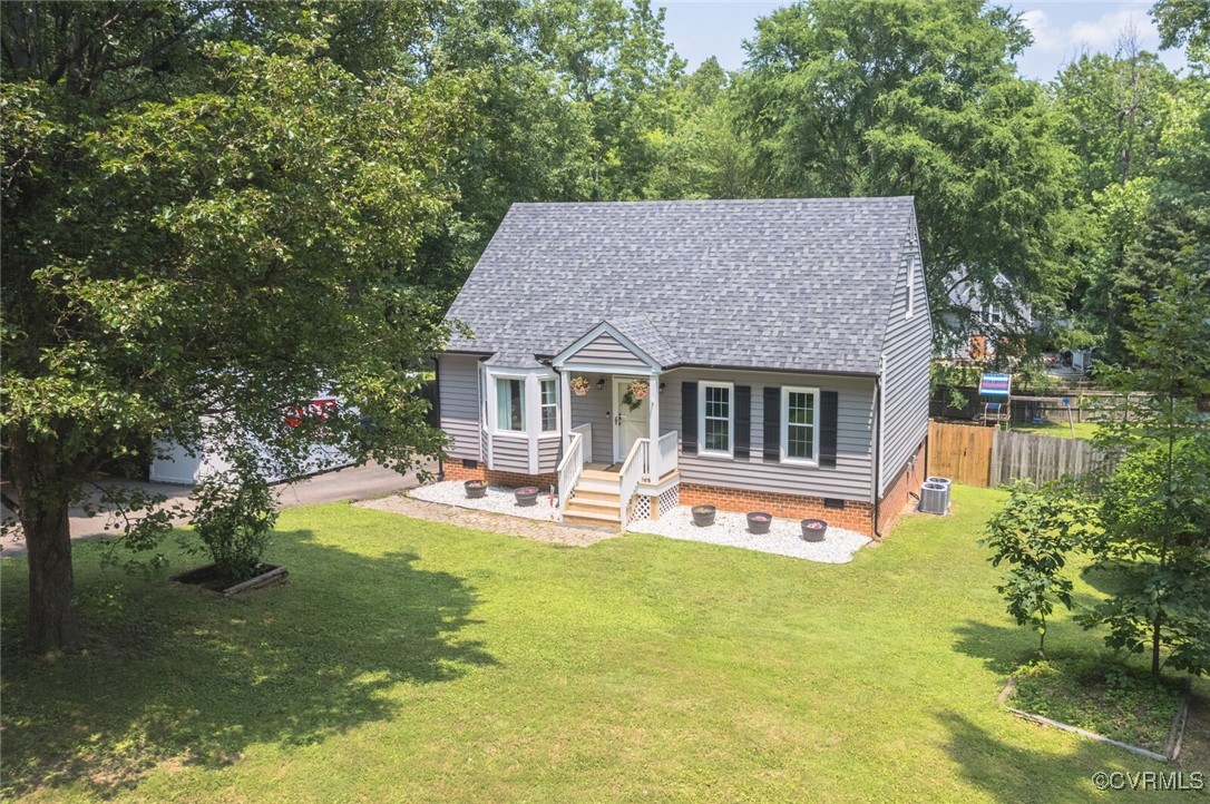 7313 Key Deer Circle Midlothian, VA 23112 - Photo 40 of 45 a view of a house with swimming pool and sitting area