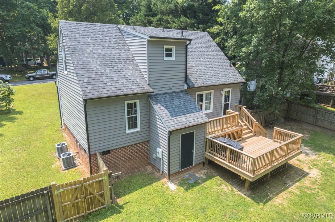 7313 Key Deer Circle Midlothian, VA 23112 - Photo 42 of 45 a view of a house with pool and chairs