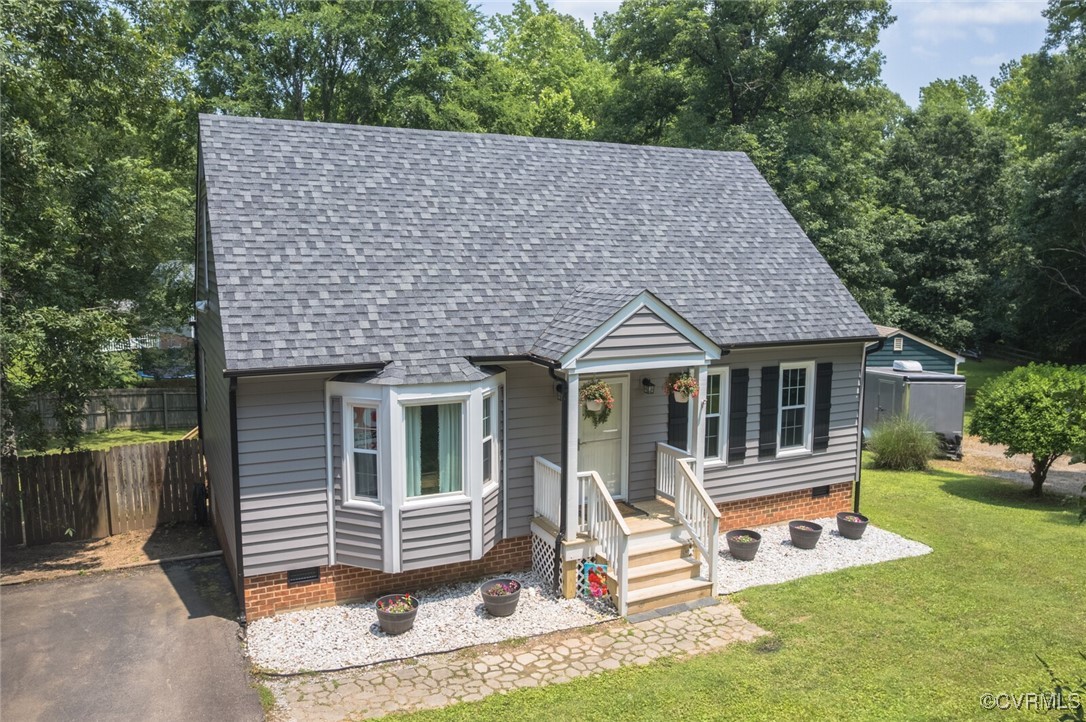 7313 Key Deer Circle Midlothian, VA 23112 - Photo 43 of 45 an aerial view of a house with swimming pool and wooden fence