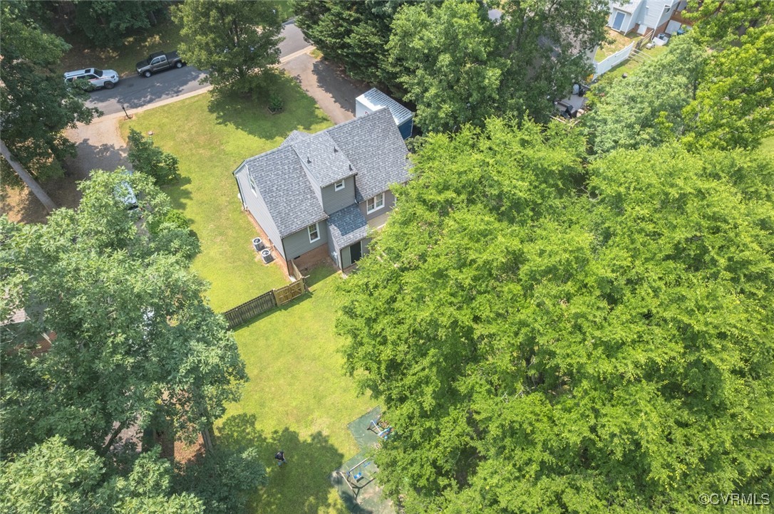 7313 Key Deer Circle Midlothian, VA 23112 - Photo 45 of 45 an aerial view of a house with swimming pool and garden