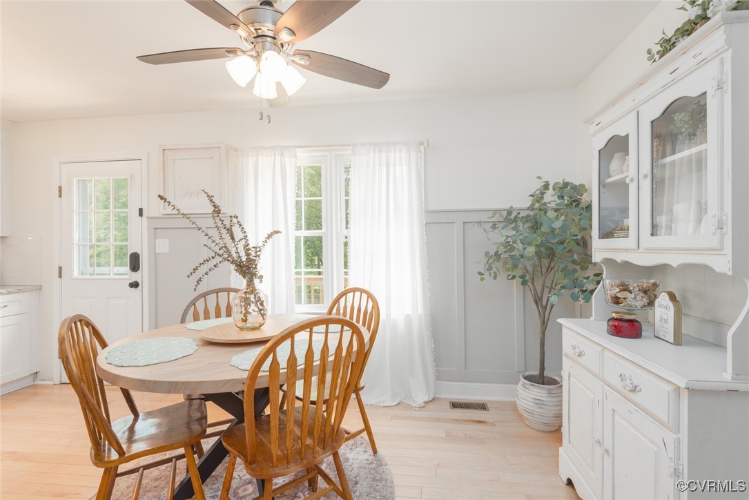 7313 Key Deer Circle Midlothian, VA 23112 - Photo 9 of 45 a dining room with furniture and window