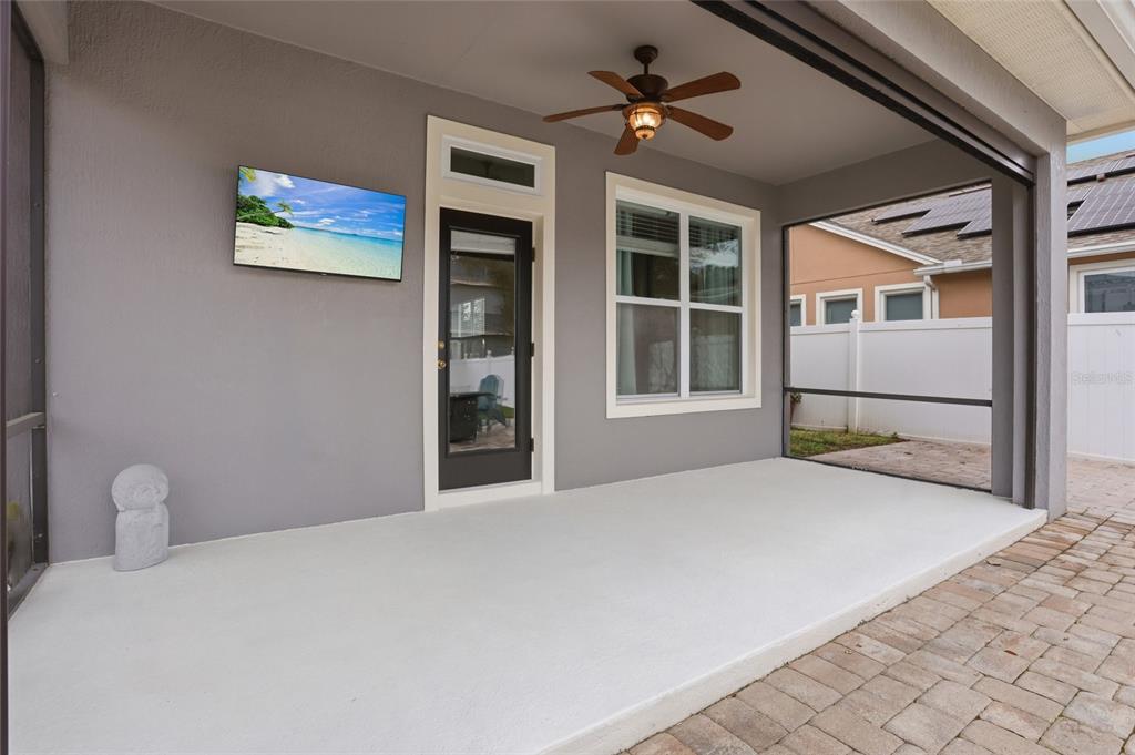 13013 Overstreet Road Windermere, FL 34786 - Photo 34 of 47 a bedroom with a bed and a large window