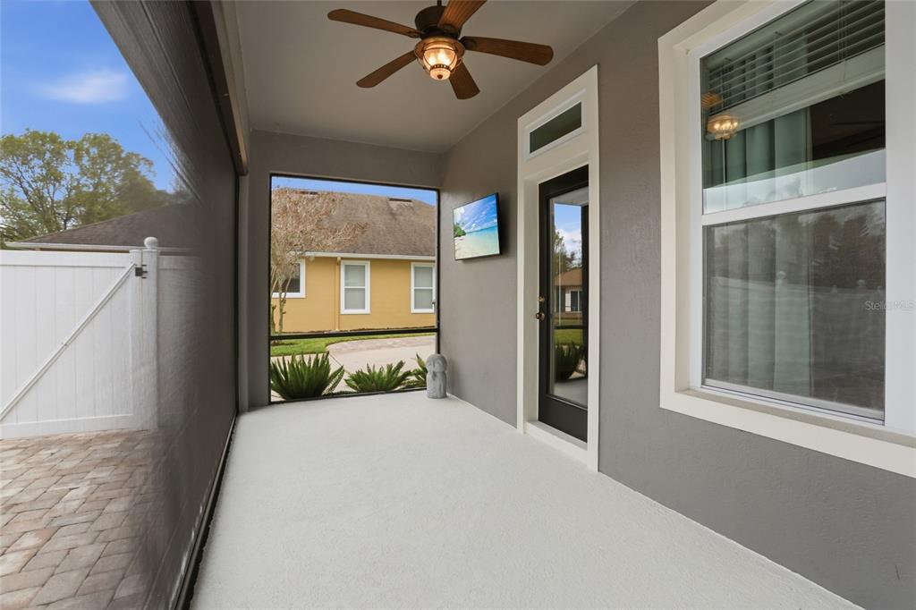 13013 Overstreet Road Windermere, FL 34786 - Photo 35 of 47 a bedroom with a bed and a window