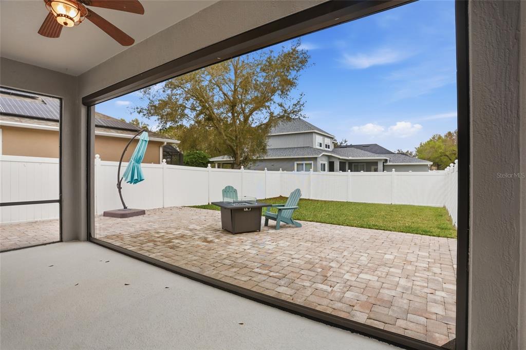 13013 Overstreet Road Windermere, FL 34786 - Photo 36 of 47 a bathroom with a granite countertop sink and a mirror