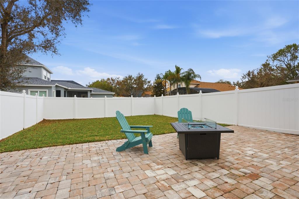 13013 Overstreet Road Windermere, FL 34786 - Photo 37 of 47 a view of a terrace with chairs