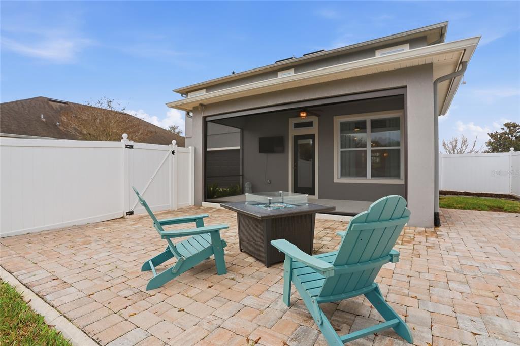 13013 Overstreet Road Windermere, FL 34786 - Photo 38 of 47 a view of two chairs in the patio