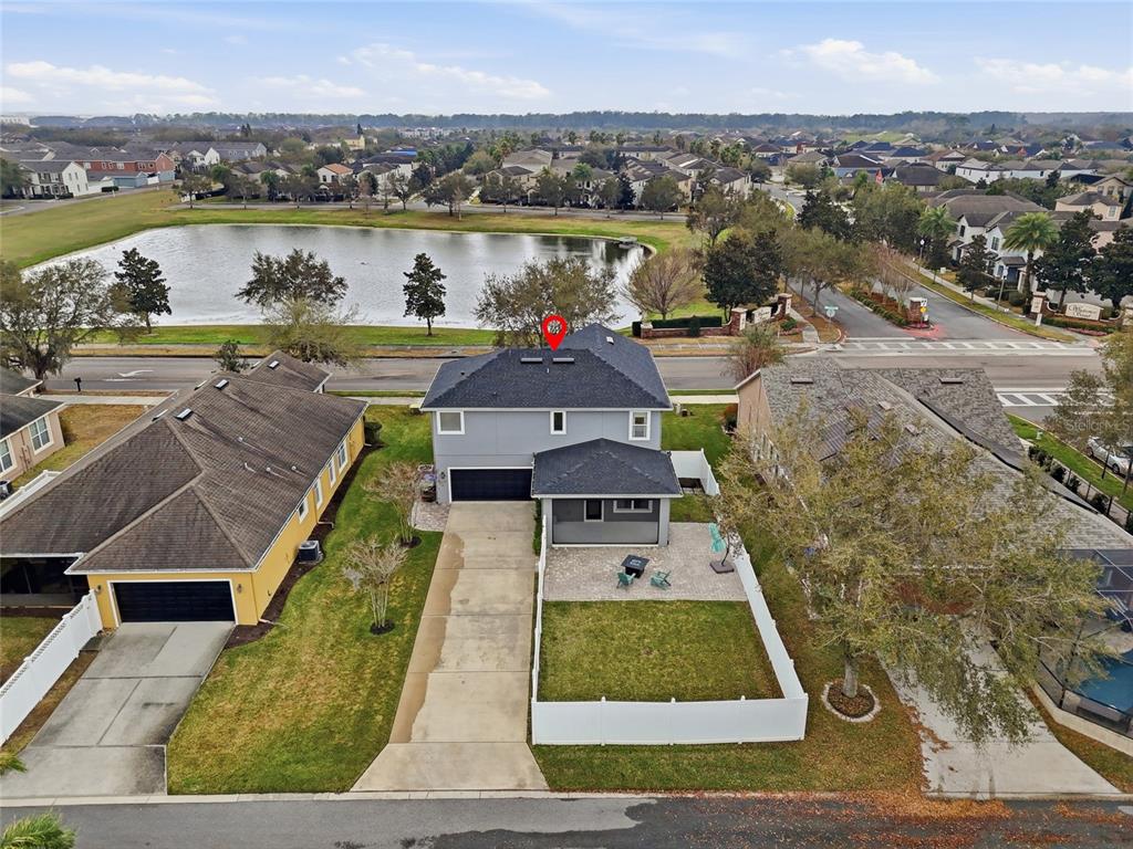 13013 Overstreet Road Windermere, FL 34786 - Photo 43 of 47 a view of a city with lawn chairs