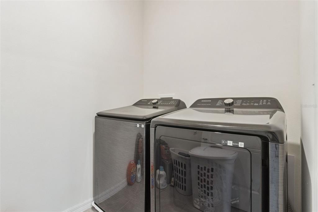 3914 Resting Robin Avenue Bartow, FL 33830 - Photo 34 of 45 a utility room with dryer and washer