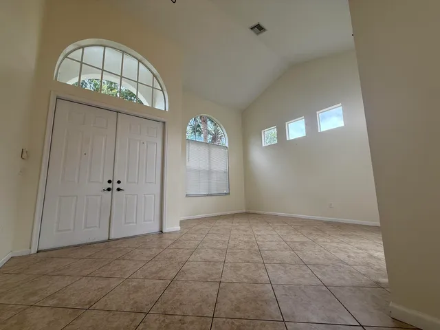 a view of an entryway with a hallway