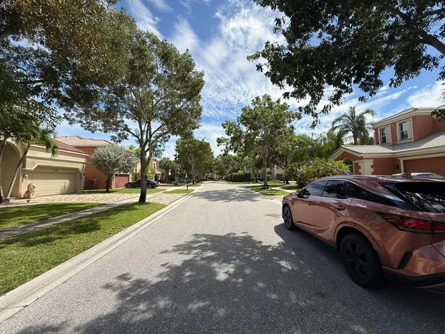 a view of street with parked cars