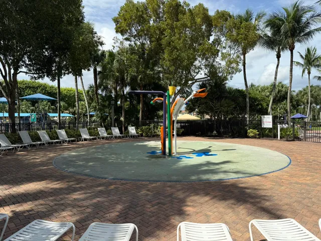 an aerial view of residential house with outdoor space and swimming pool