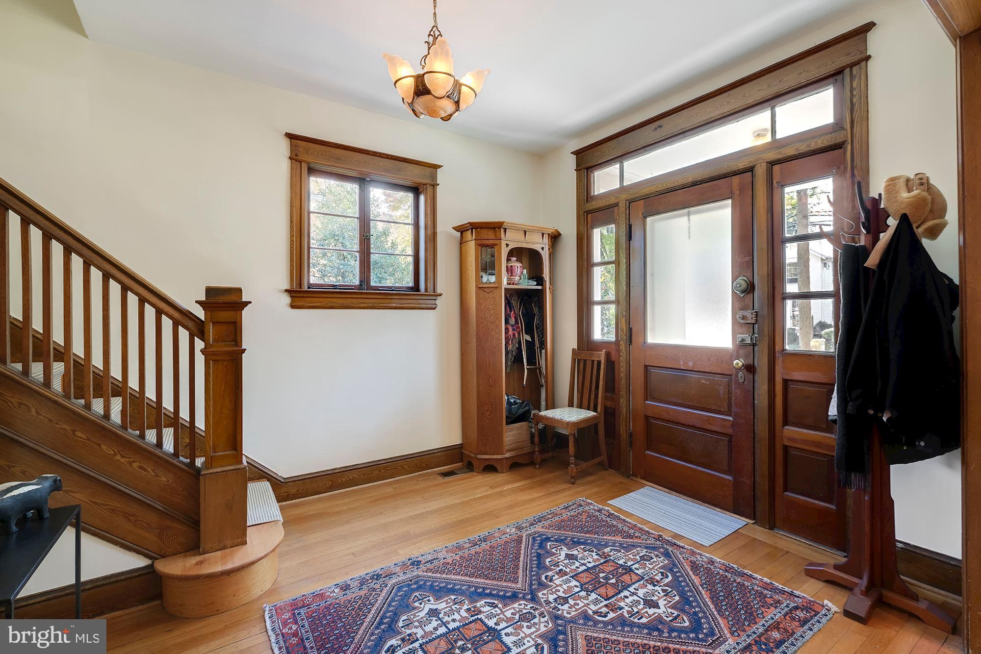 3523 Bradley Lane Chevy Chase, MD 20815 - Photo 5 of 28 Gracious entry foyer with unpainted woodwork