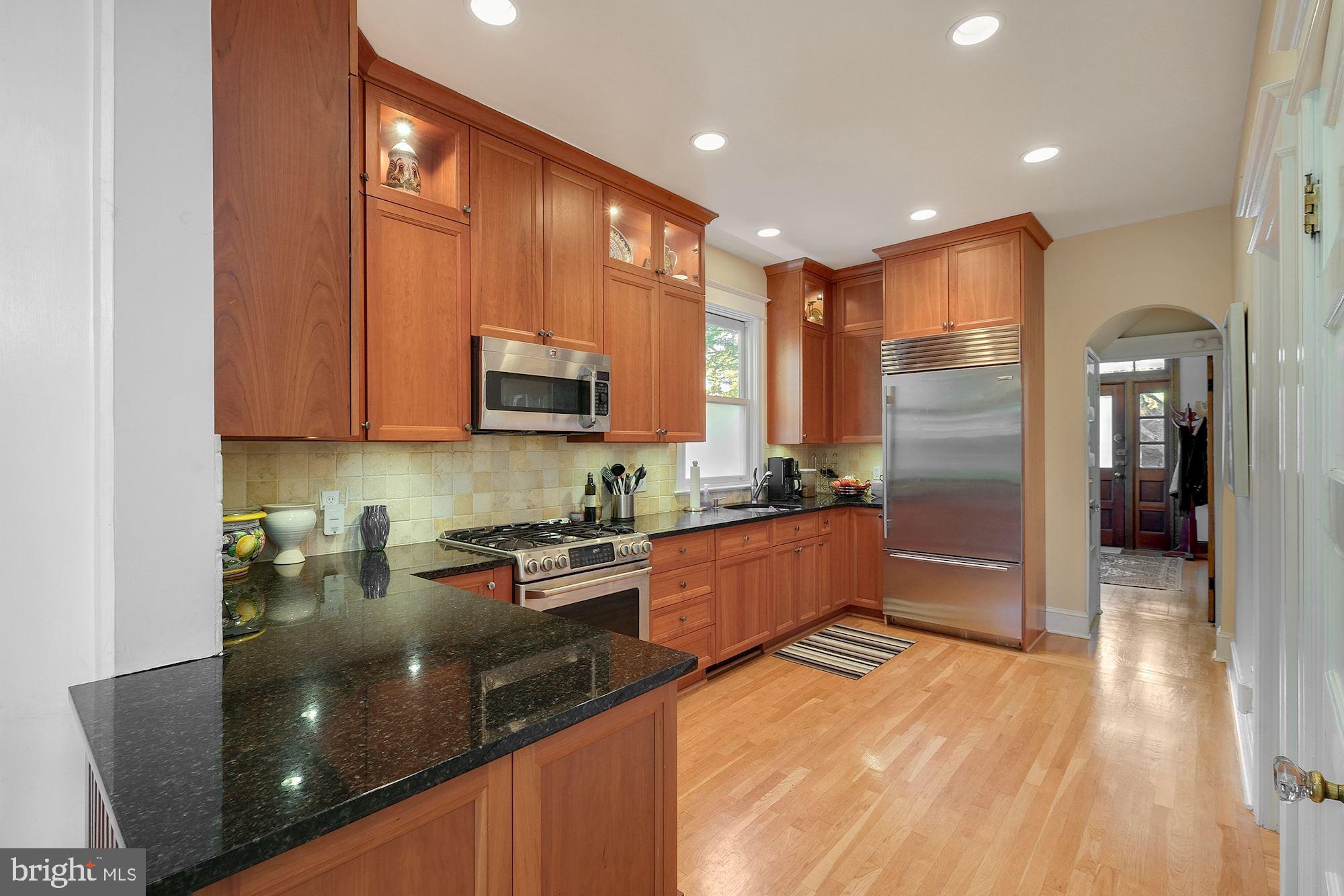 3523 Bradley Lane Chevy Chase, MD 20815 - Photo 10 of 28 Kitchen with breakfast bar