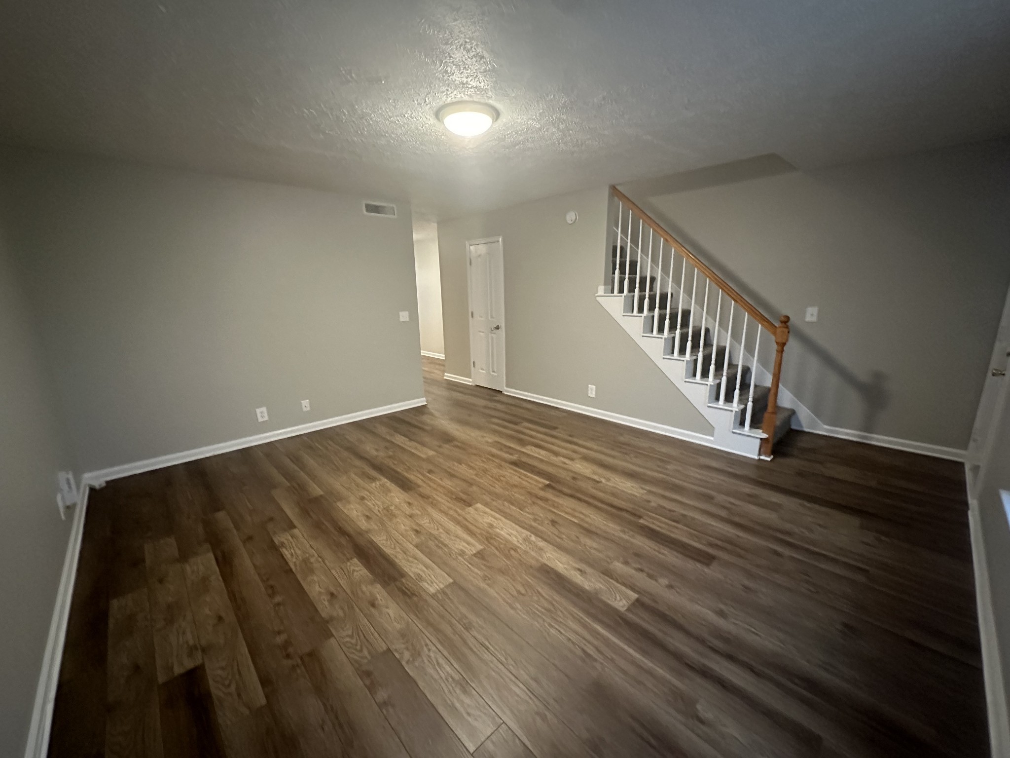 2410 Willowbrook Drive, Unit B Murfreesboro, TN 37130 - Photo 2 of 14 wooden floor in a hall with an entryway