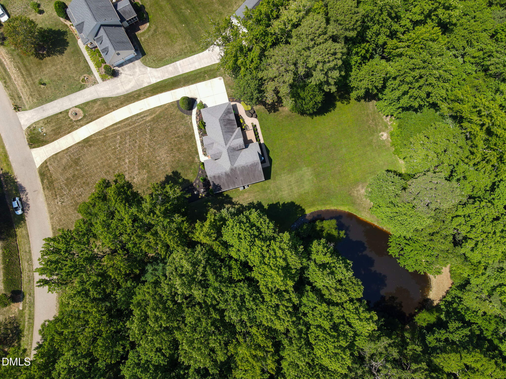 1112 Tyler Farms Drive Raleigh, NC 27603 - Photo 78 of 78 an aerial view of a house with a yard and lake view