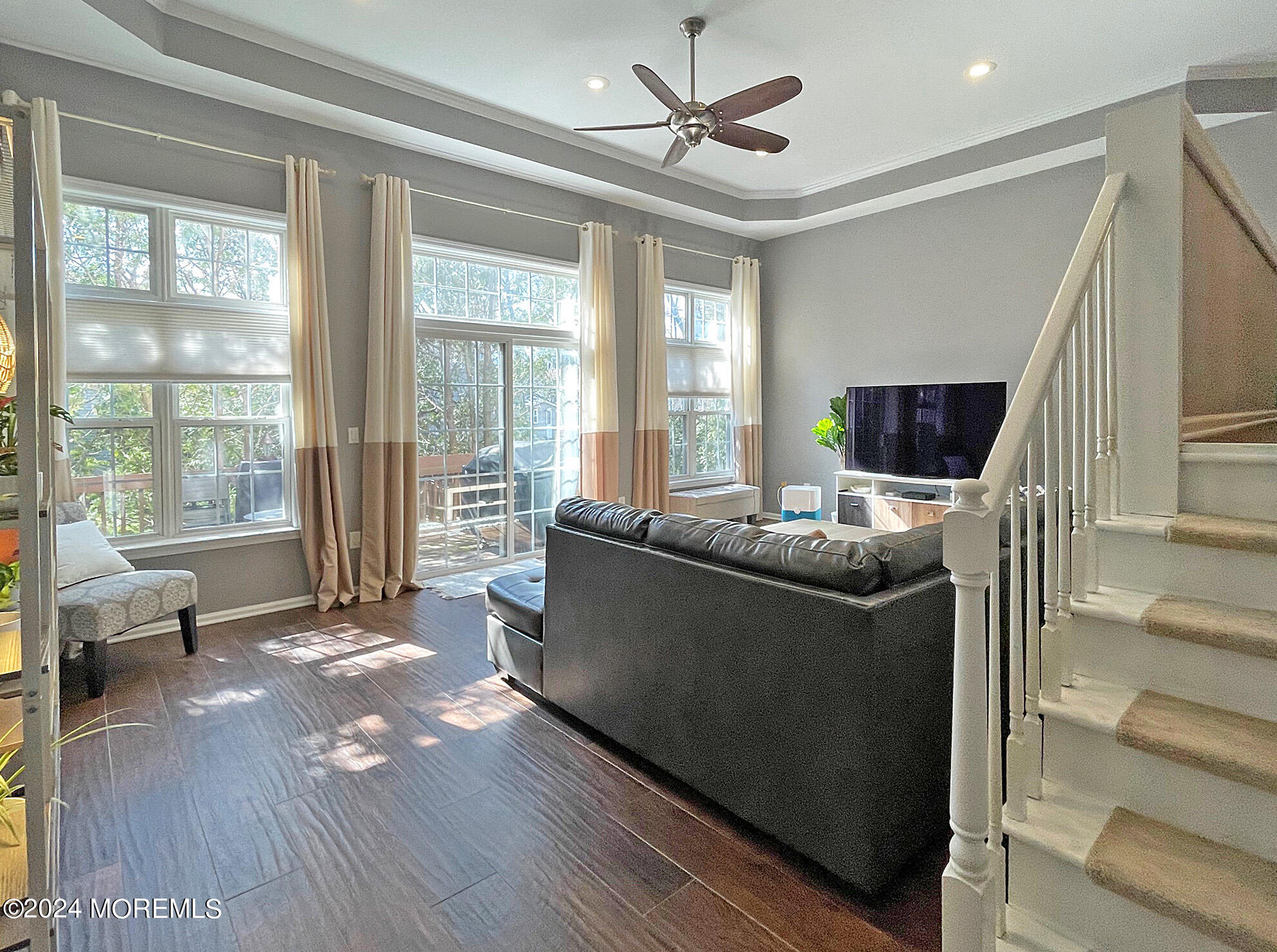 139 3rd Street, Unit 2 Keyport, NJ 07735 - Photo 1 of 36 a living room with furniture and a flat screen tv