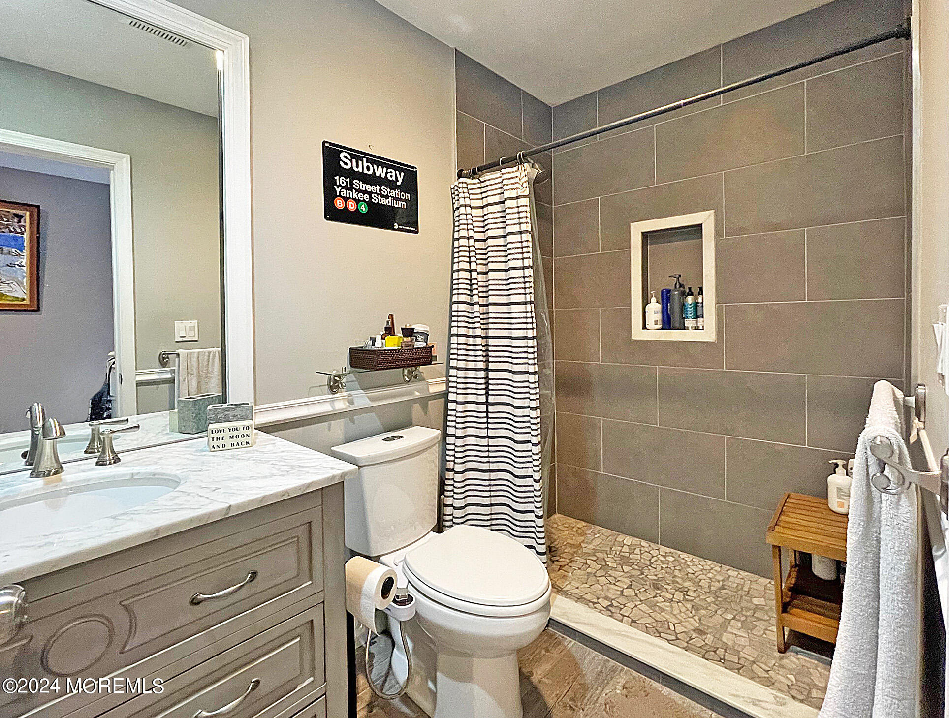 139 3rd Street, Unit 2 Keyport, NJ 07735 - Photo 14 of 36 a bathroom with a sink a toilet and shower