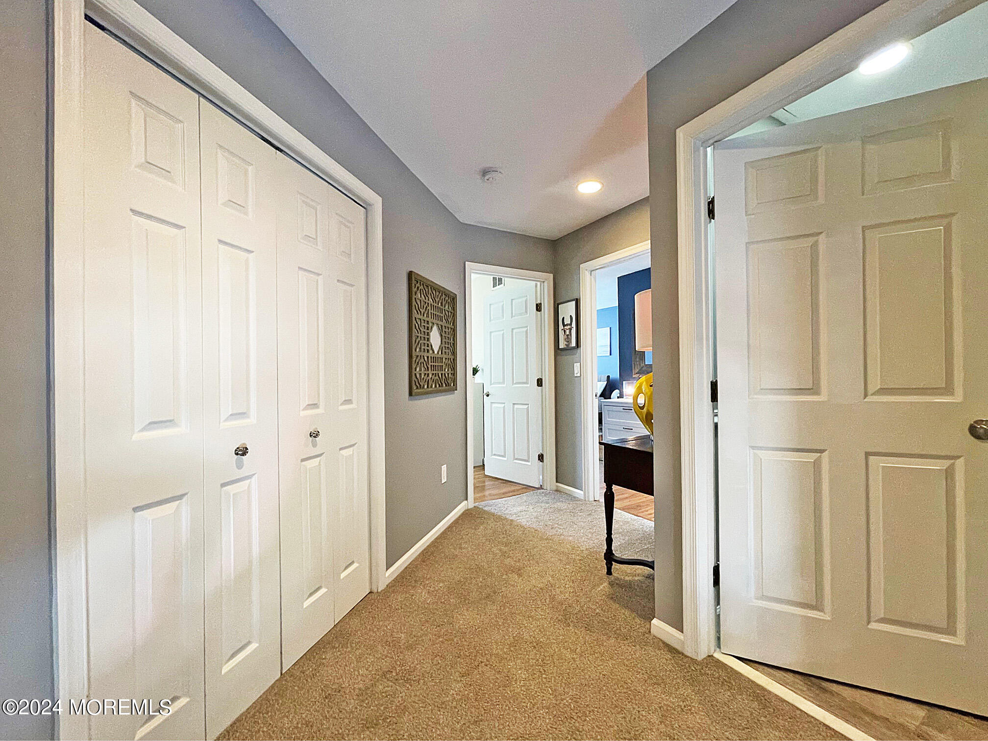 139 3rd Street, Unit 2 Keyport, NJ 07735 - Photo 15 of 36 a view of a hallway with wooden shelves