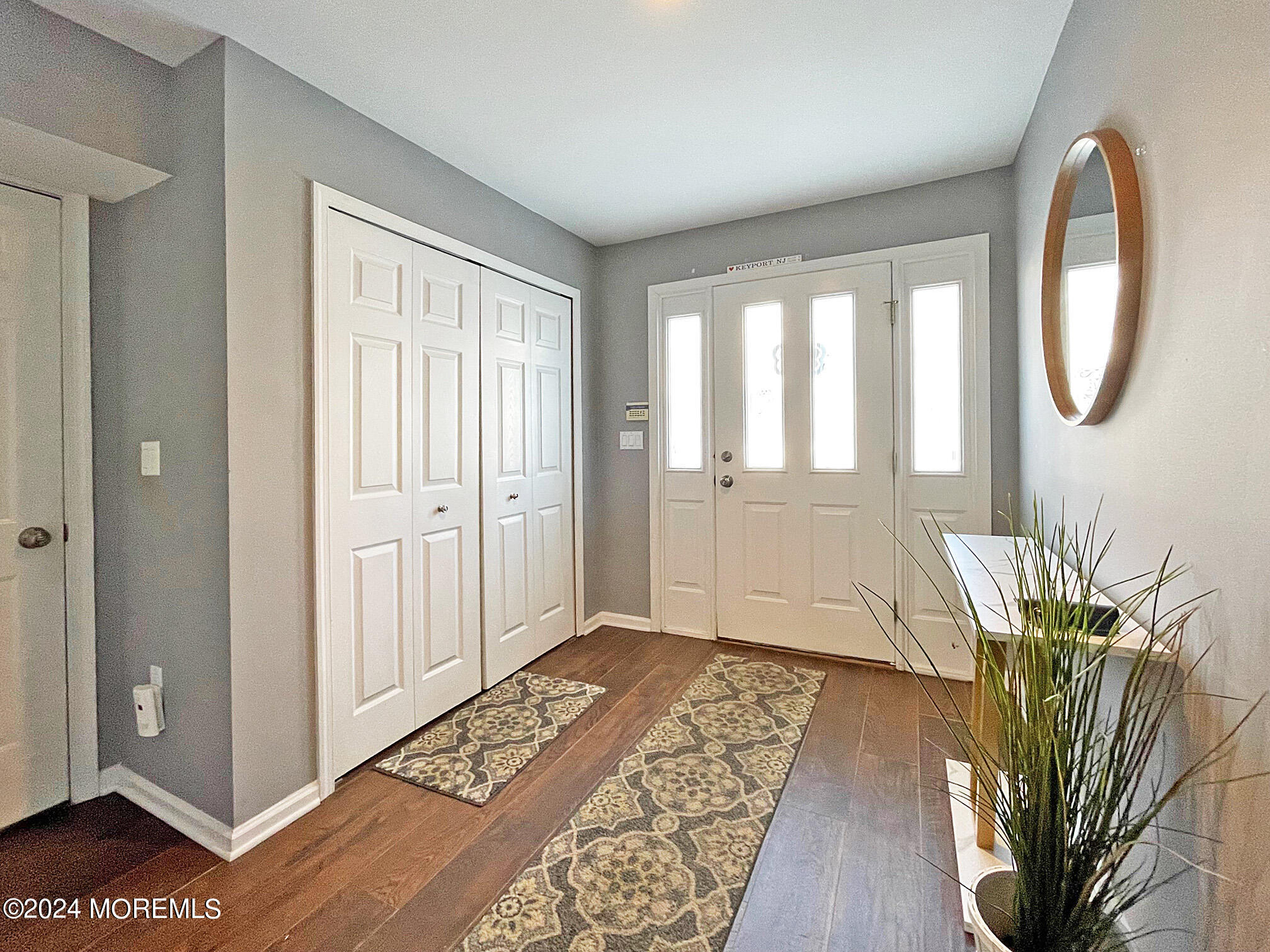 139 3rd Street, Unit 2 Keyport, NJ 07735 - Photo 32 of 36 a view of entryway with wooden floor