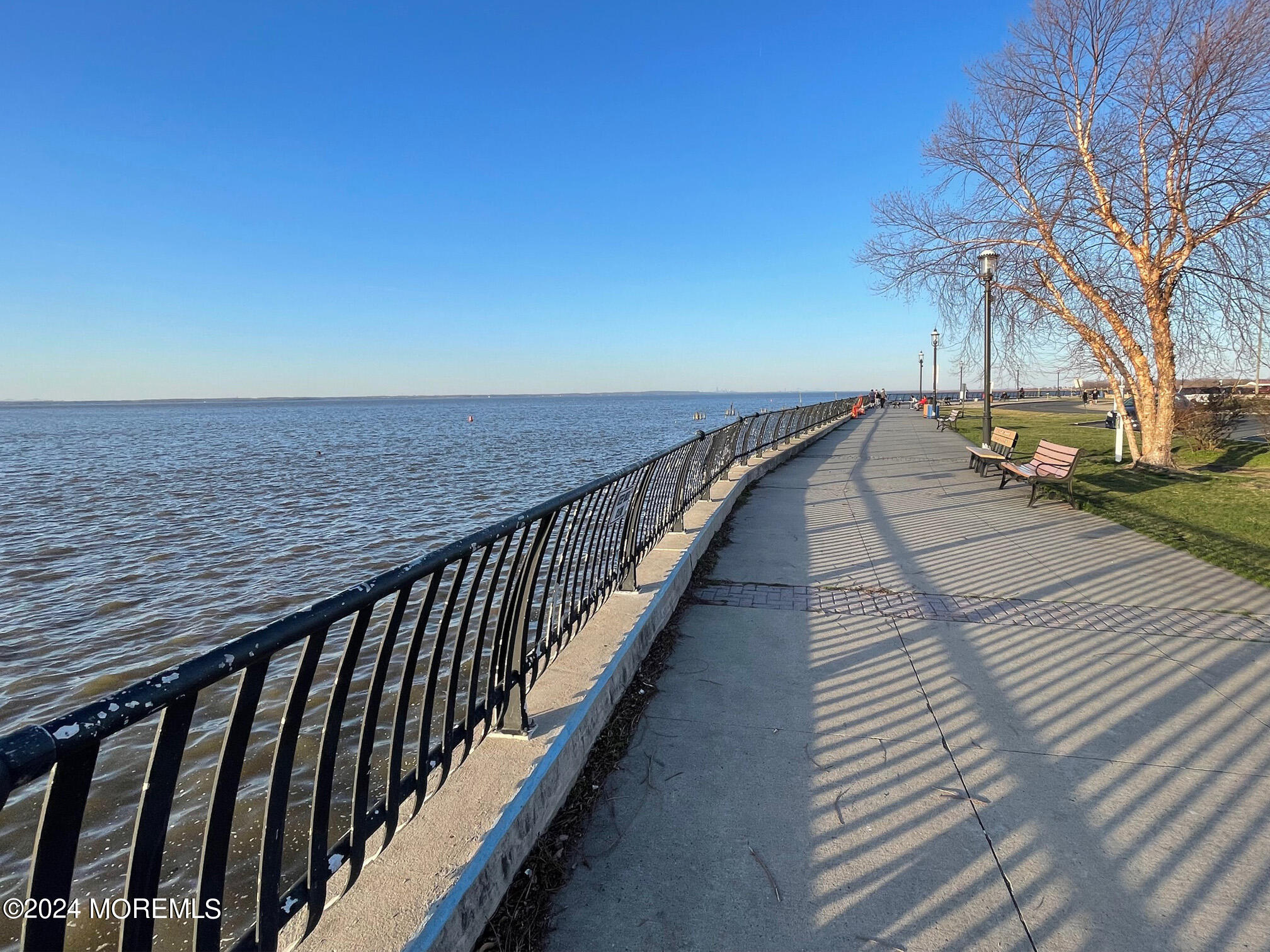 139 3rd Street, Unit 2 Keyport, NJ 07735 - Photo 35 of 36 a view of balcony with wooden floor and fence
