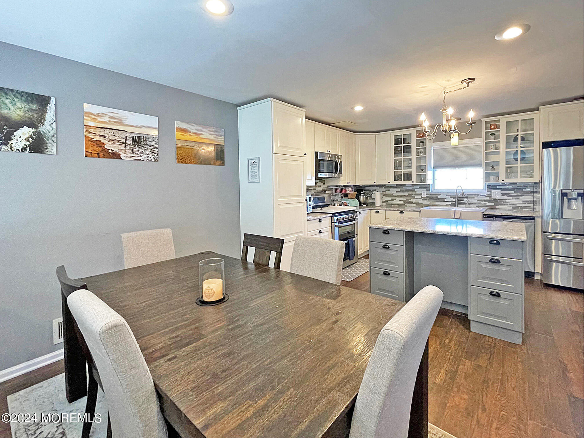 139 3rd Street, Unit 2 Keyport, NJ 07735 - Photo 6 of 36 a open dining room with furniture and wooden floor