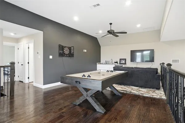 a workspace with furniture and wooden floor