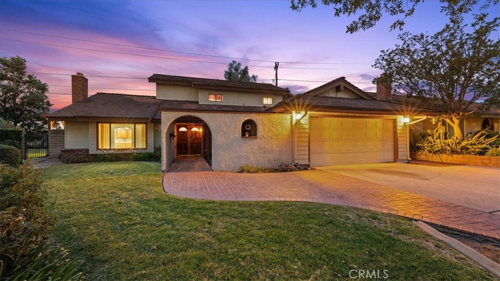 6313 Canterwood Road La Verne, CA 91750 - Photo 1 of 1 a front view of a house with garden