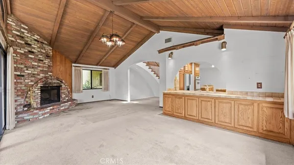 a bedroom with a bed and walk in closet