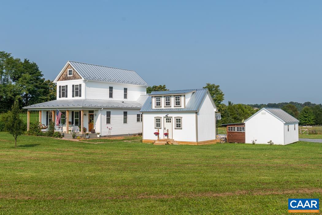 318 Battlefield Road Waynesboro, VA 22980 - Photo 45 of 47 a front view of house with yard and trees in the background