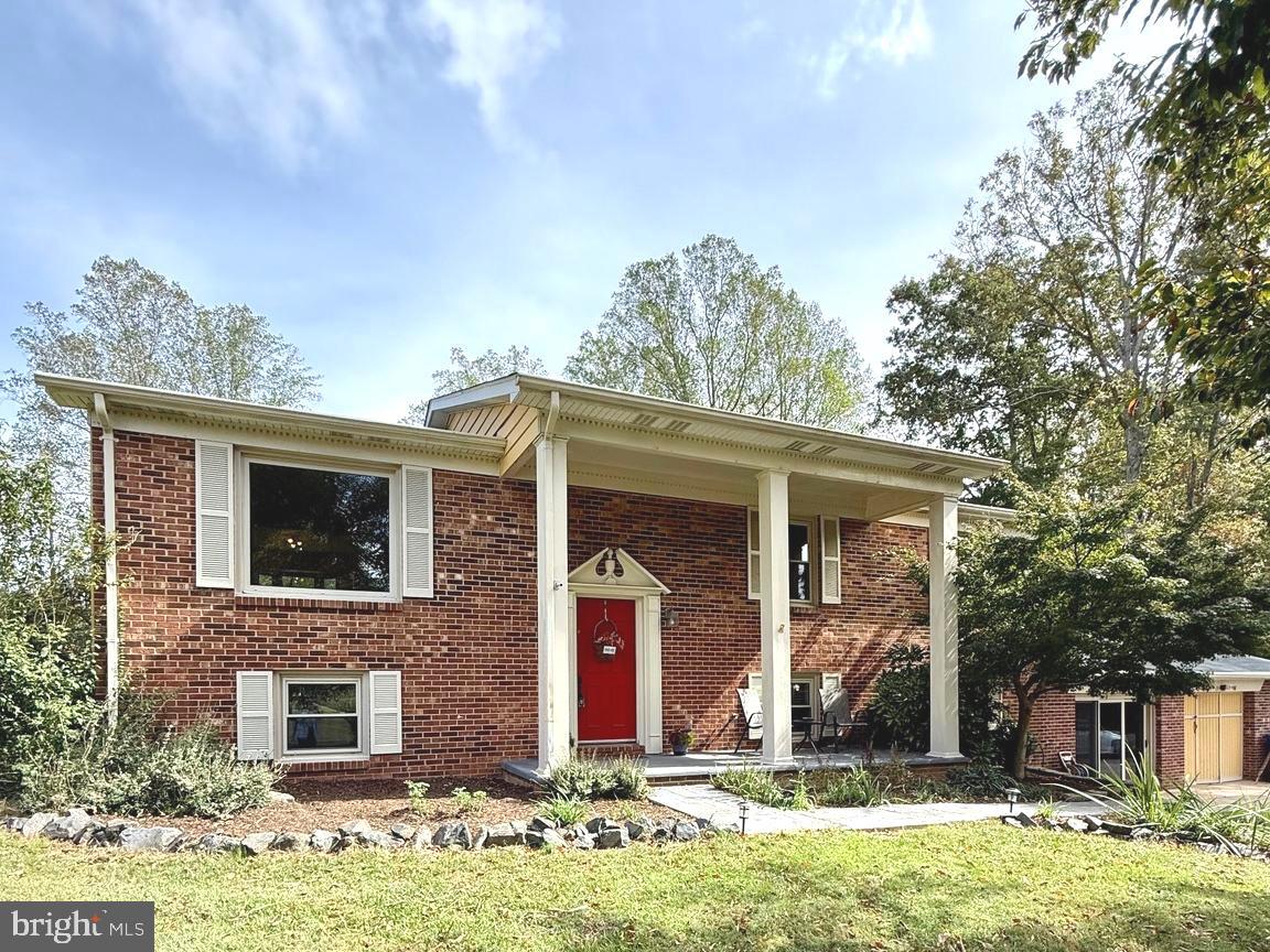 a front view of house with yard