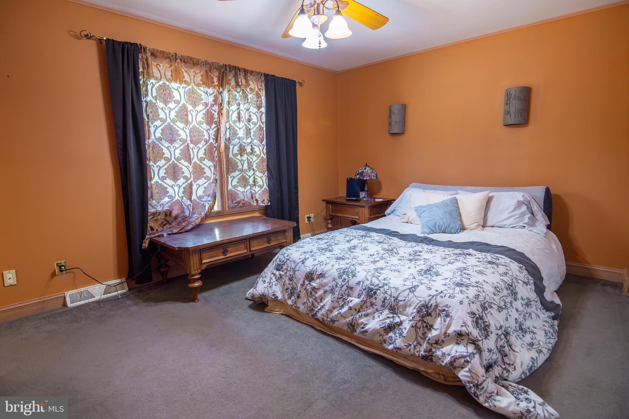 163 Rock Hill Church Road Stafford, VA 22556 - Photo 12 of 43 a bedroom with a bed and window