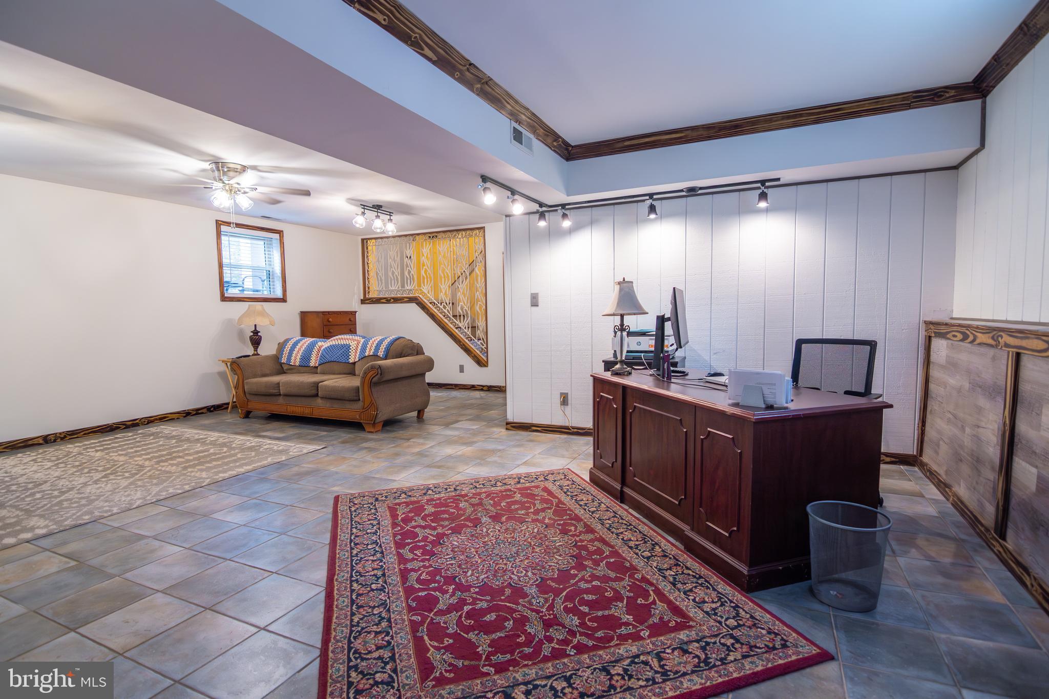 163 Rock Hill Church Road Stafford, VA 22556 - Photo 26 of 43 a living room with furniture and a mirror