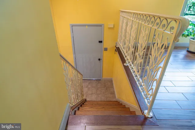 a view of entryway with wooden floor