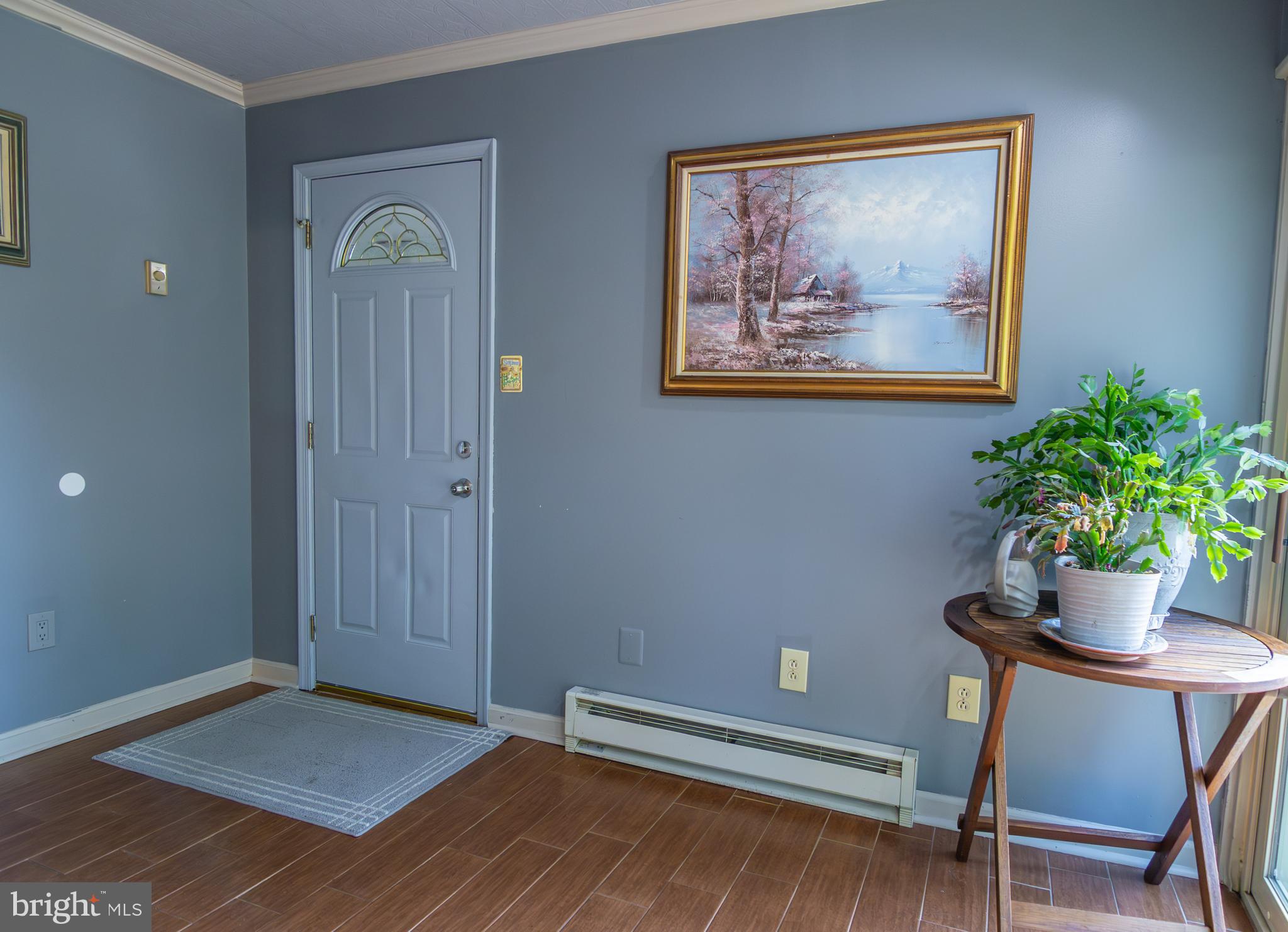 163 Rock Hill Church Road Stafford, VA 22556 - Photo 36 of 43 a workspace with furniture and a potted plant